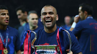 Dani Alves with the Champions League trophy in 2015.
