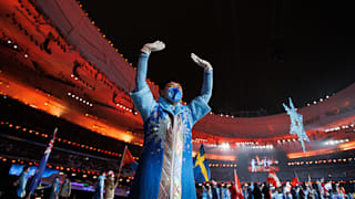 Volunteer on stage during the parade of athletes at the Closing Ceremony at the National Stadium