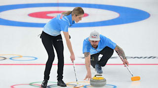 Sean Beighton and Victoria Persinger of Team United States compete during the Curling Mixed Doubles Round Robin