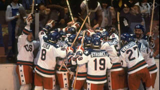 The USA Team celebrate their win against Russia after the final  in the Ice Hockey event