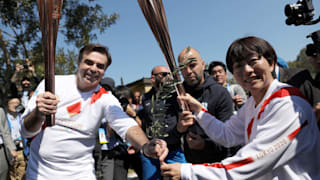 The first torch bearers at the Olympic Torch lighting ceremony