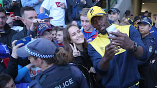 Usain Bolt takes a selfie before Central Coast's A-League trial match with Newcastle
