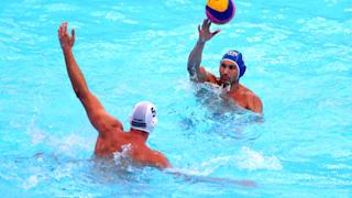 Pietro Figlioli #4 of Italy passes the ball against Marton Vamos #5 of Hungary during the Men's Water Polo Semifinal match on day thirteen of the Gwangju 2019 FINA World Championships at Nambu University on July 25, 2019 in Gwangju, South Korea. (Photo by Catherine Ivill/Getty Images)