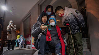 Family watches broadcast of Beijing 2022 Opening Ceremony