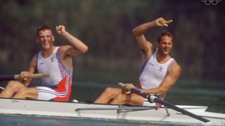 Steven Redgrave and Mathew Pinsent signal victory after a win in the Coxless Pairs event