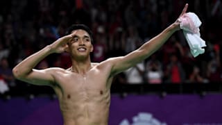 Topless salute: Jonatan Christie celebrates. (Photo by Robertus Pudyanto/Getty Images)