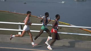  Gelindo Bordin of Italy Ahmed Salah of Djibou and Douglas Wakihuri of Kenya running