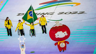 Aline Rocha and Cristian Ribera, flag bearers of Brazil during the Beijing 2022 Paralympic Winter Games Opening Ceremony