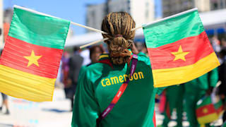 A Cameroon Olympic athlete flies the flag for her country