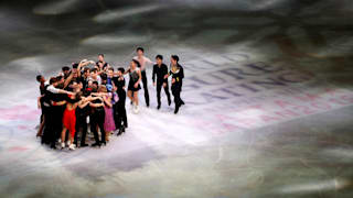 The skaters embrace on ice as the World Figure Skating Championships gala concludes (REUTERS/Issei Kato)