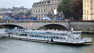  Team Japan, Team Jordan, Team Kazakhstan and Team Kenya pass beneath the Pont Au Change