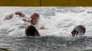 18th FINA World Swimming Championships - Men's 10km Open Water Final - Yeosu EXPO Ocean Park, Yeosu, South Korea - July 16, 2019. First placed Florian Wellbrock of Germany, second placed Marc-Antoine Olivier of France and and third placed Rob Muffels of Germany at finish. REUTERS/Evgenia Novozhenina