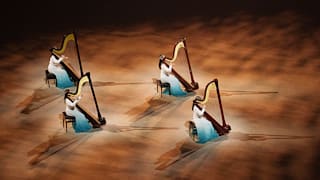 Harpists perform during the Closing Ceremony at the Beijing National Stadium