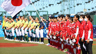 Team Australia and Team Japan stand in the infield prior to their game during the Tokyo 2020 Olympic Games at Fukushima Azuma Baseball Stadium on July 21, 2021 in Fukushima, Japan. (Photo by Yuichi Masuda/Getty Images)