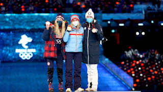 Medallists pose with their medals during the Women's 30km Mass Start medal ceremony 