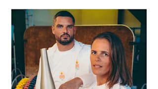 Florent Manaudou and his sister Laure carrying the Flame