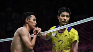 Christie shakes with Chinese Taipei's Chou Tienchen after the final. (Photo by Robertus Pudyanto/Getty Images)