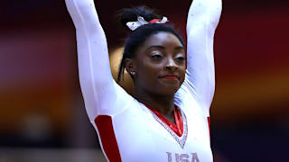 Simone Biles salutes during the vault final at the 2018 Worlds