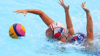 Akari Inaba #3 of Japan competes for the ball against Elisa Queirolo #5 of Italy during their Women's Water Polo Preliminary round match at the Gwangju 2019 FINA World Championships at Nambu University on July 16, 2019 in Gwangju, South Korea. (Photo by Clive Rose/Getty Images)