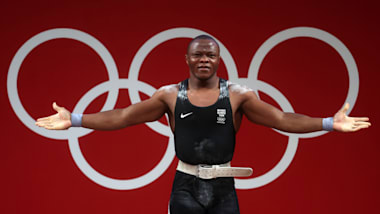 Refugee Olympian Cyrille Tchatchet selected for GB team at European weightlifting championships