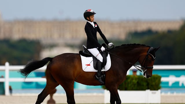 Unable to hear, Para dressage great Laurentia Tan relies on her other senses to visu...