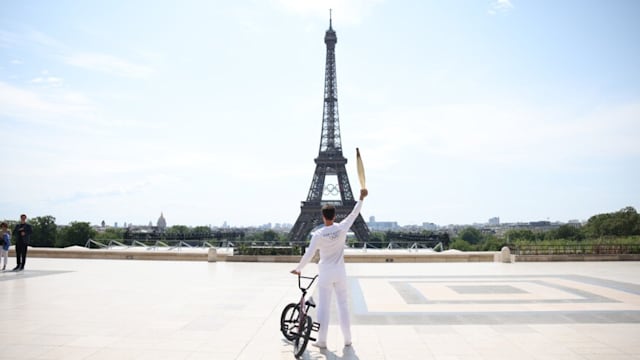 Parisians give the Olympic Torch Relay a historic welcome with the start of the games just around the corner