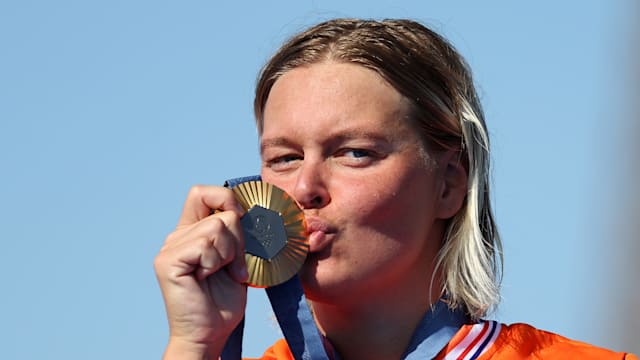 Sharon van Rouwendaal reclaims 10km swimming Olympic title