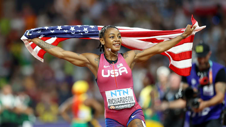 Sha'Carri Richardson celebrates winning the women's 100m at the 2023 World Athletics Championships 