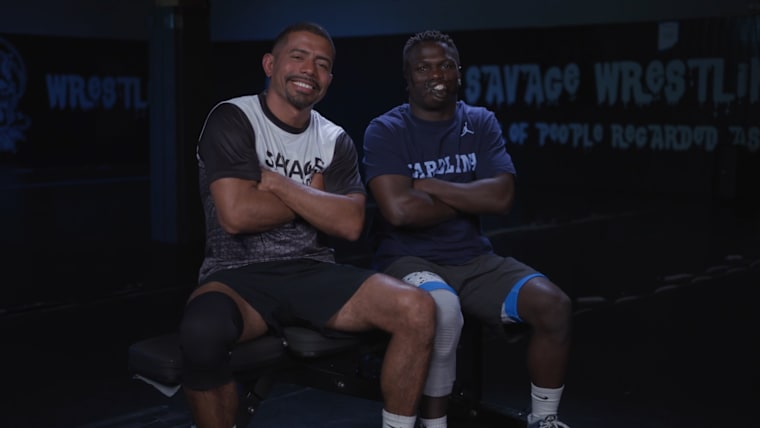 Dunia Sibomana-Rodriguez (R) and his adoptive father Miguel