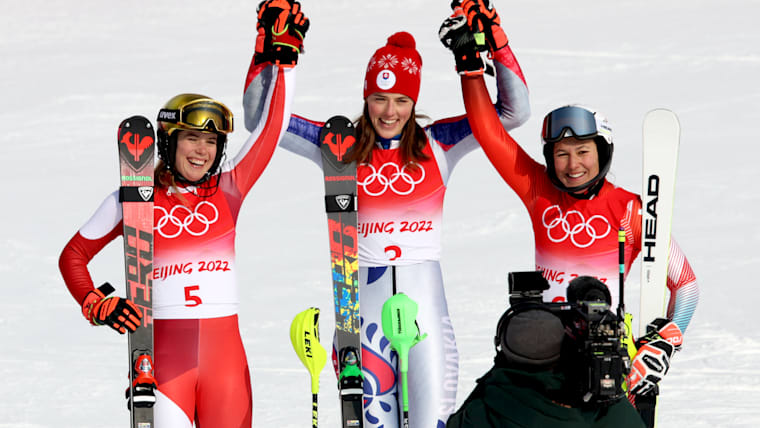 Gold medallist Petra Vlhova of Team Slovakia (C), Silver medallist Katharina Liensberger of Team Austria (L), and Bronze medalist Wendy Holdener of Team Switzerland (R) pose following the Women's Slalom Run 2 on day five of the Beijing 2022 Winter Olympic Games