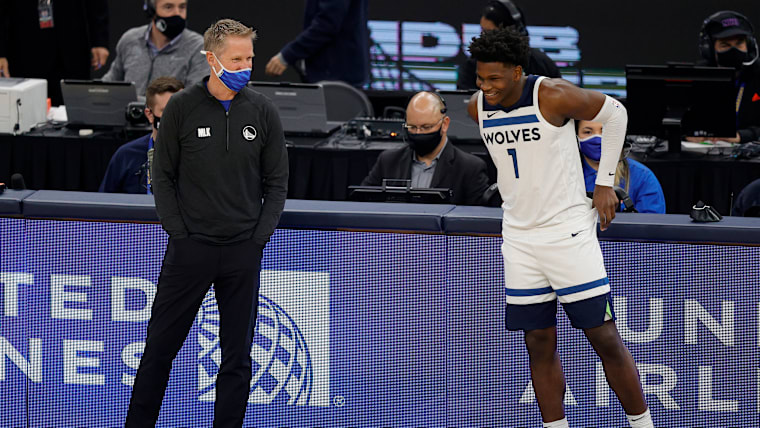 Golden State Warriors head coach Steve Kerr speaks to Anthony Edwards #1