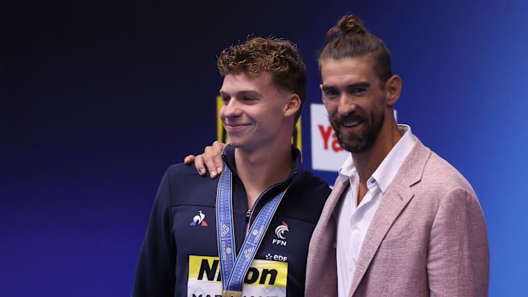 Michael Phelps presented Leon Marchand with a gold medal in the men's 400m individual medley at the Fukuoka 2023 World Aquatics Championships.