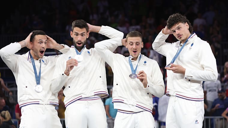  Men's 3x3 basketball Silver medalists Franck Seguela, Lucas Dussoulier, and Timothe Vergiat, Jules Rambaut of Team France celebrate during the medal ceremony 