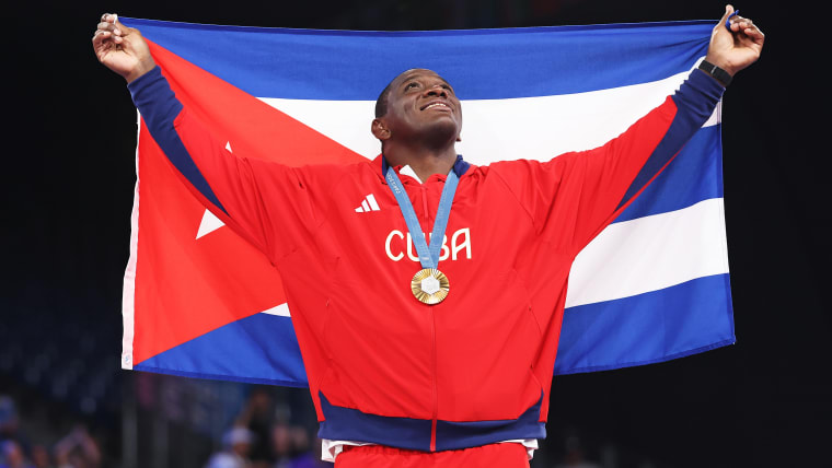 Gold medallist Mijain Lopez Nunez of Team Cuba celebrates