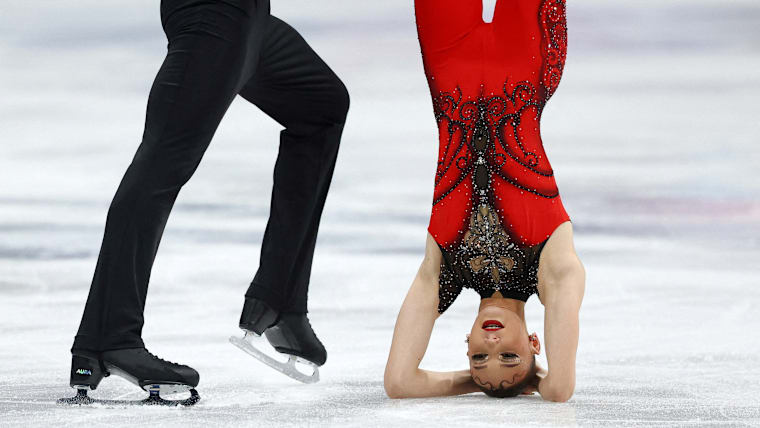 Anastasiia Metelkina and Luka Berulava sit second after the pairs short program at Milano Cortina 2026.