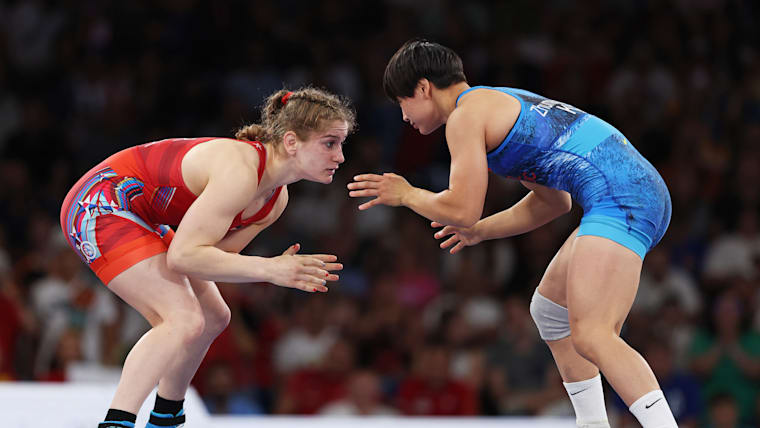 Amit Elor of Team United States (red) competes with Meerim Zhumanazarova of Team Kyrgyzstan
