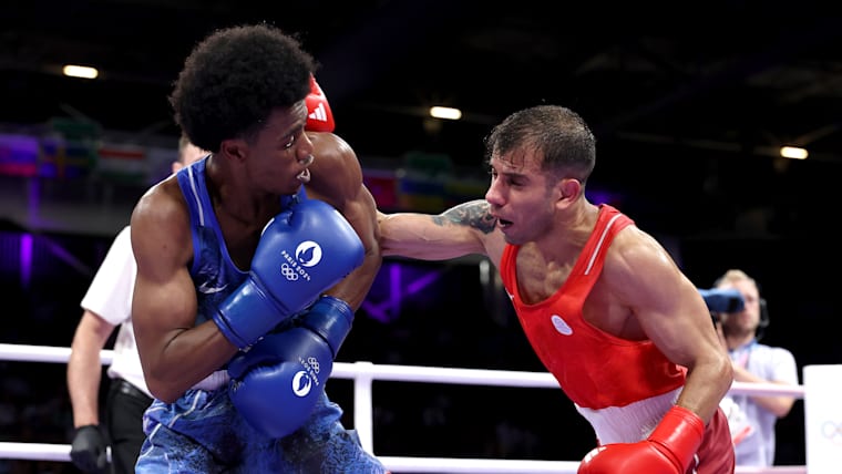 Refugee boxer Omad Ahmadisafa narrowly loses to Roscoe Hill
