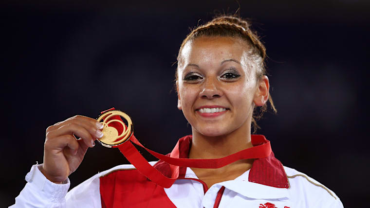 Gold medalist Becky Downie of England wins the uneven bars final at the Glasgow 2014 Commonwealth Games 