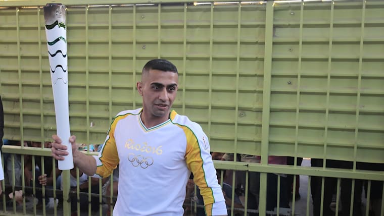 Syrian swimmer Ibrahim carried torch for the refugees of the world
