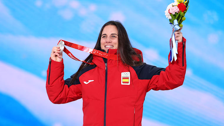 Queralt Castellet celebrates with her silver medal in the women's snowboard halfpipe 