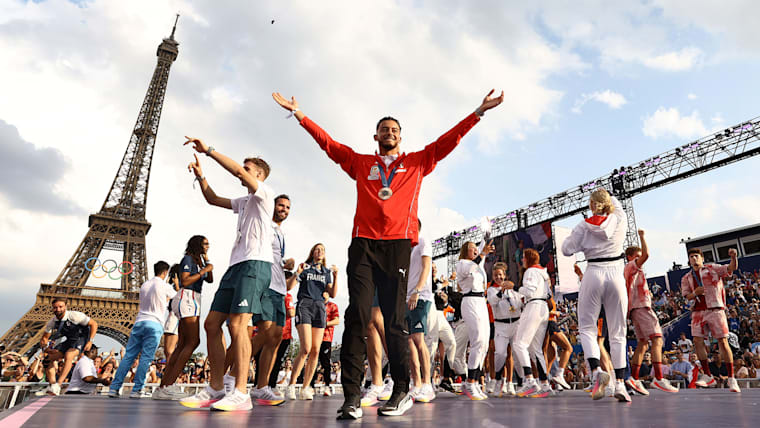 PARIS, FRANCE - AUGUST 01: Athletes dance onstage during day six of the Olympic Games Paris 2024 at Champions Park on August 01, 2024 in Paris, France.