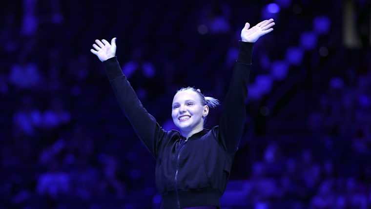 Jade Carey waves