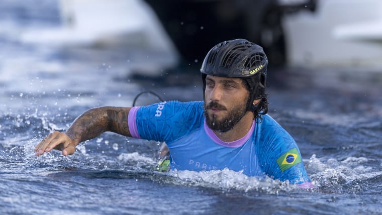 Filipe Toledo of Team Brazil paddles during round three of surfing on day three of the Olympic Games Paris 2024 at on July 29, 2024 in Teahupo'o, French Polynesia