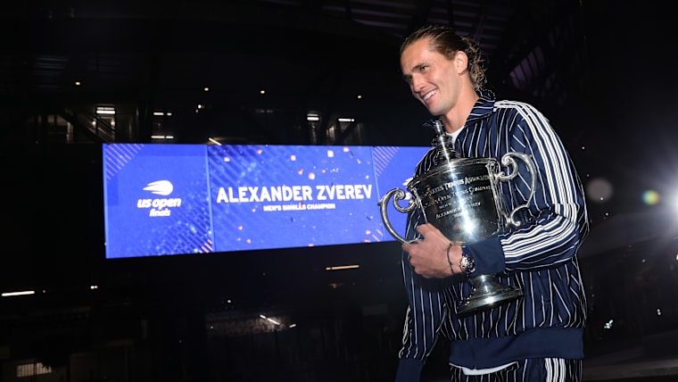 Alexander Zverev with the 2026 US Open men's singles trophy