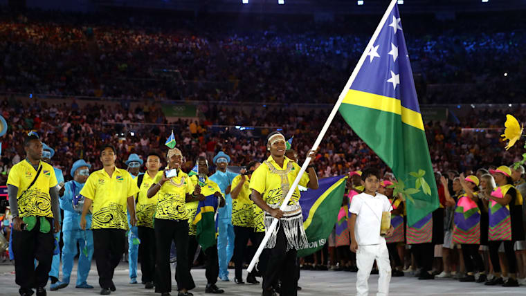 Flagbearer Jenly Wini leads out Solomon Islands at the Rio 2016 opening ceremony