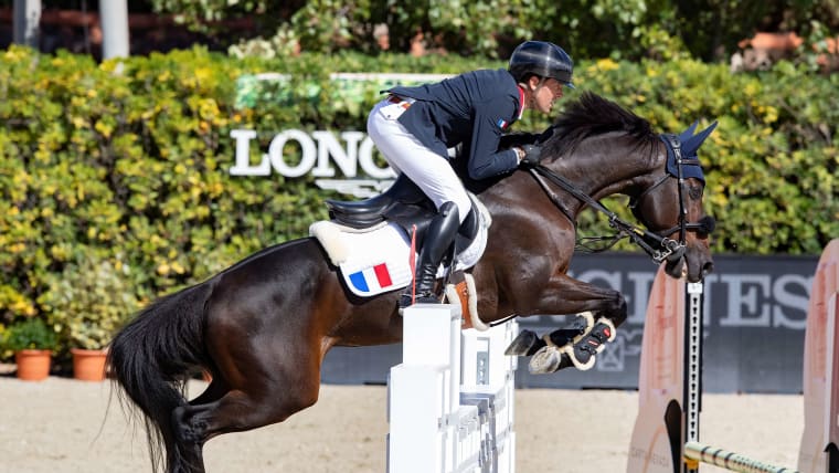 Simon Delestre competes on Cayman Jolly Jumper at the FEI Jumping Nations Cup in 2022.