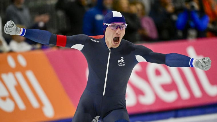 Timothy Loubineaud of France reacts to his world record time in the men's 5000m