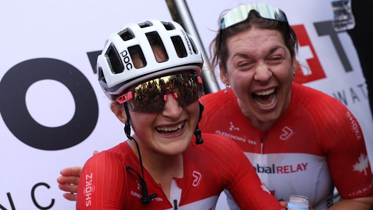 Canada's Magdeleine Vallieres celebrates winning the women's elite road race in 2025