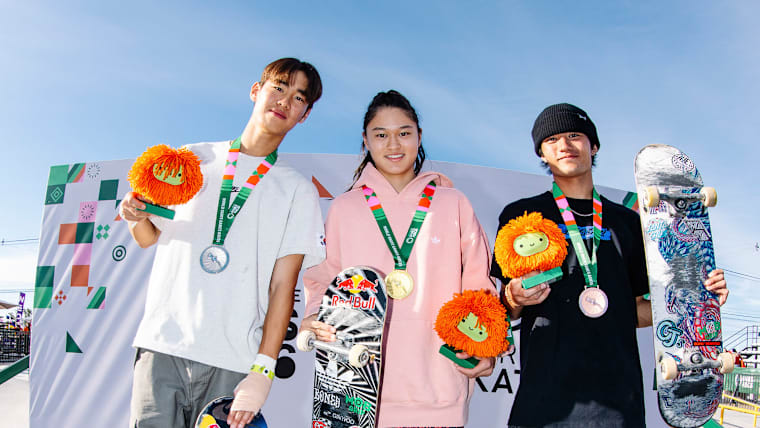 Kang Juni, Ginwoo Onodera, and Nagai Taiga celebrate their men's street skateboarding medals at the 2026 World Skate Games  