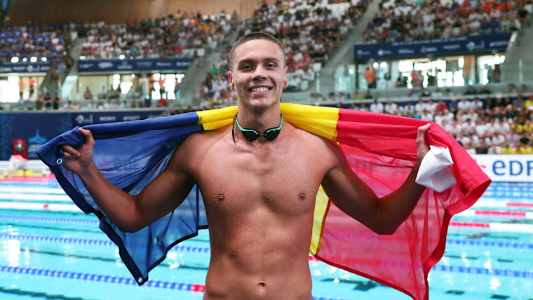 Romania's David Popovici celebrates